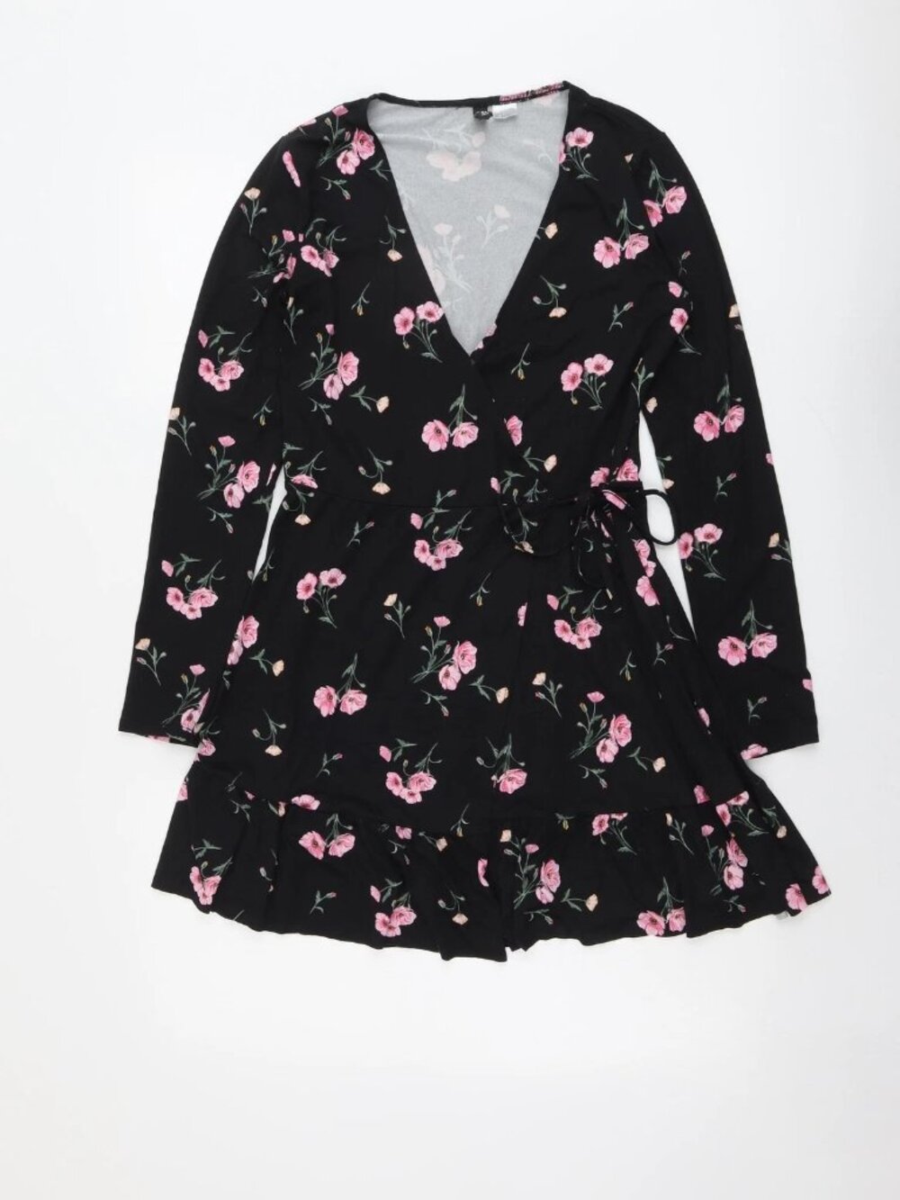A H&M women's skirt with black floral pattern